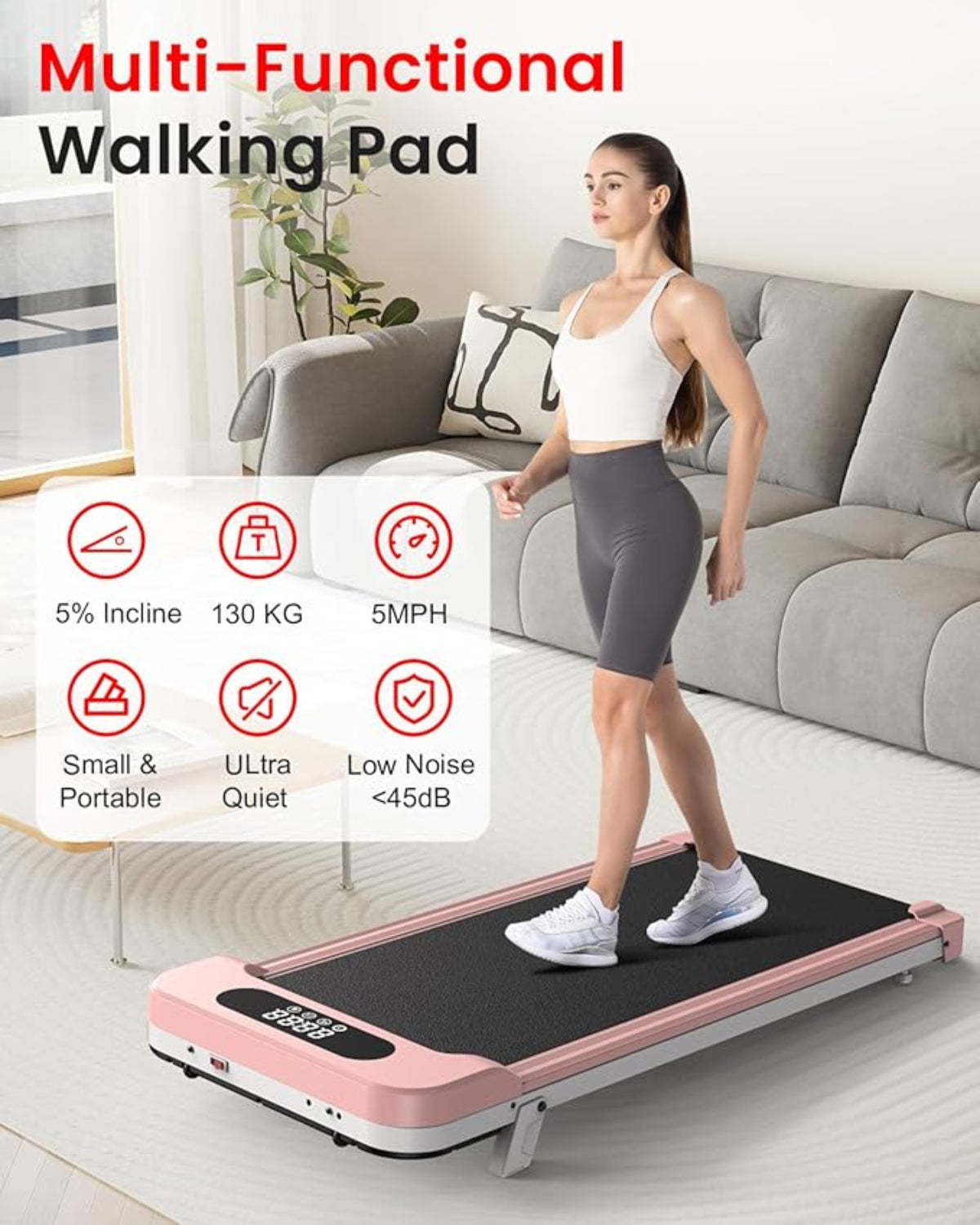 Woman using a pink multi-functional walking pad in a living room.