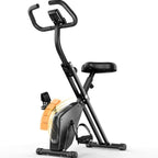 Black exercise bike with orange resistance bands on a white background